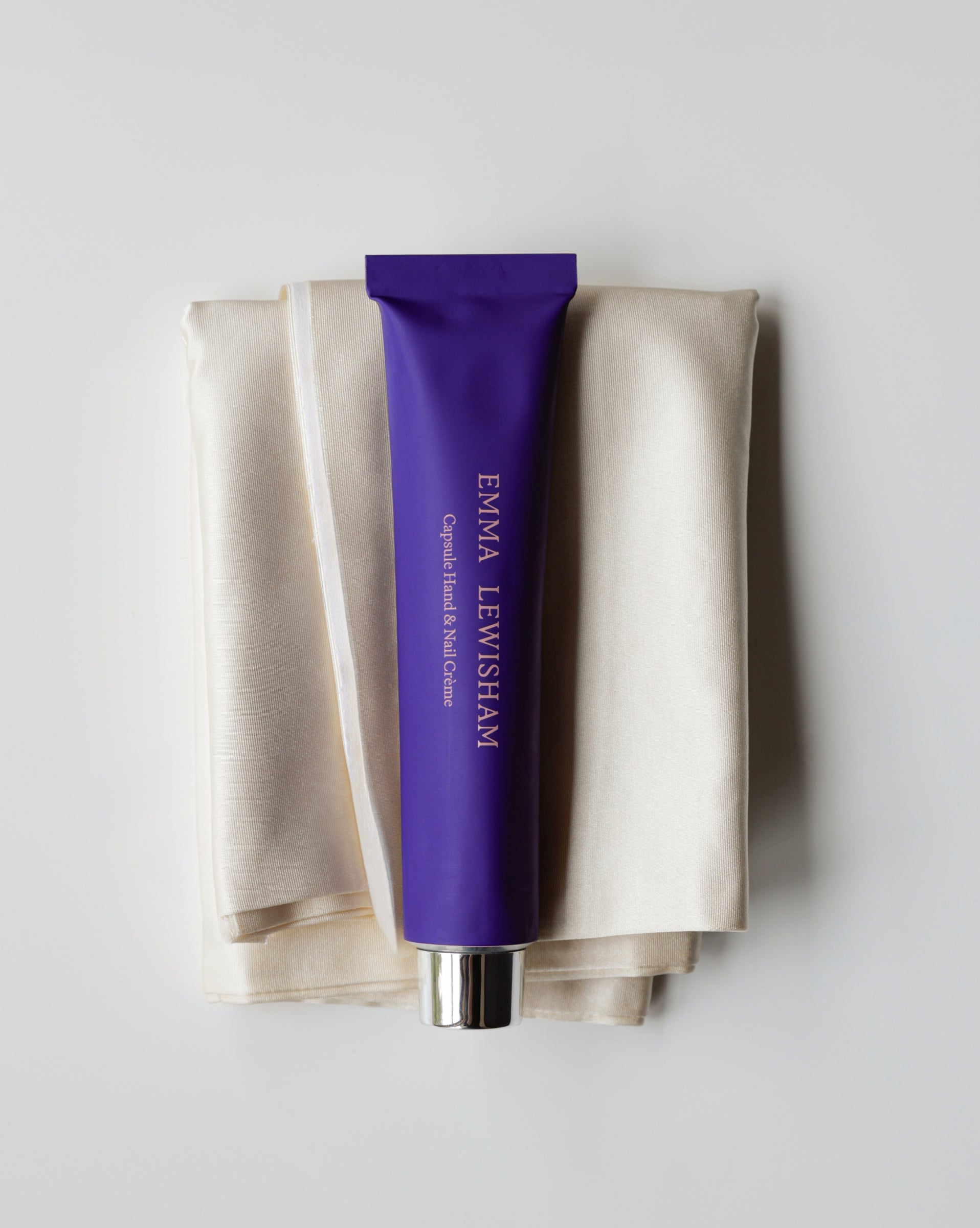 
          Capsule Hand & Nail Crème
        