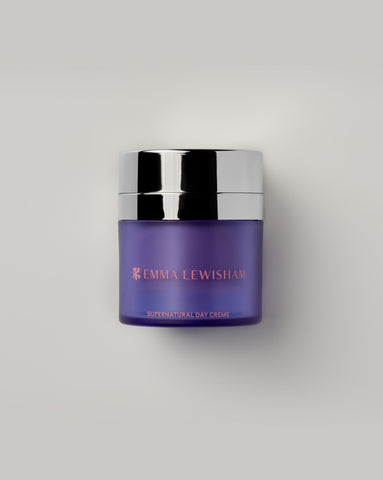 Emma Lewisham Supernatural Day Crème in a purple jar with silver lid against a light gray background.